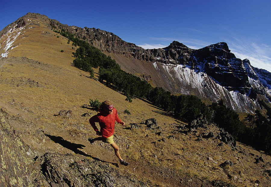 A Man Trail Runs In The Mountains Photograph By Bob Allen Fine Art