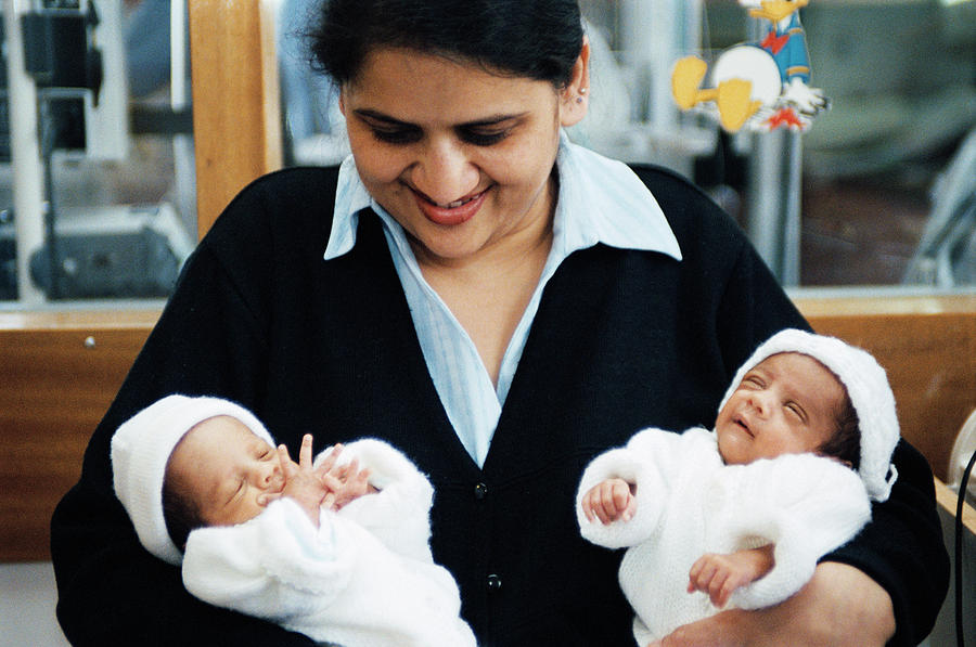 Mother Holding Newborn Twins Photograph By Mark Thomas Science Photo