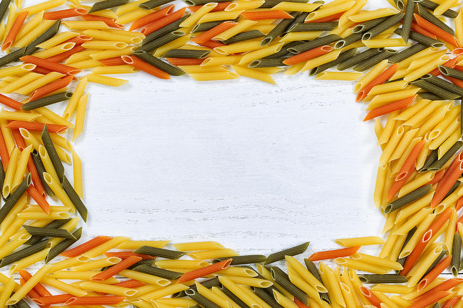 Colorful Pasta Border On White Wood Colorful Pasta Border On White Wood By Tom Baker