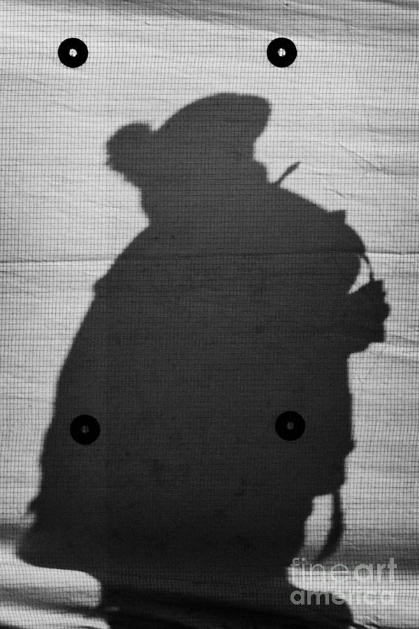  - silhouette-of-british-army-soldier-on-screen-on-crumlin-road-at-ardoyne-shops-belfast-12th-july-joe-fox