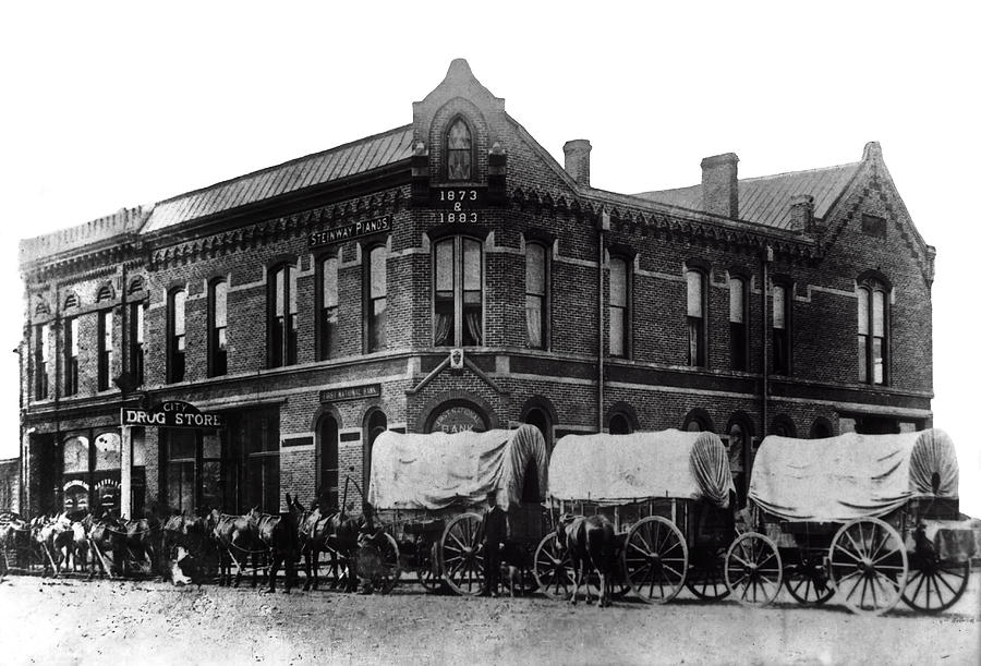 Wagon Train In Downtown Spokane 1880 Photograph by Daniel Hagerman