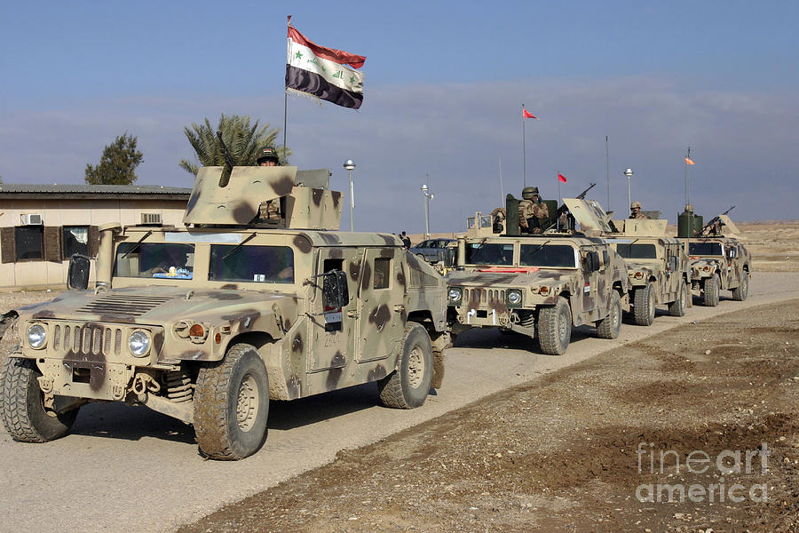 iraqi-army-soldiers-aboard-m1114-humvee-