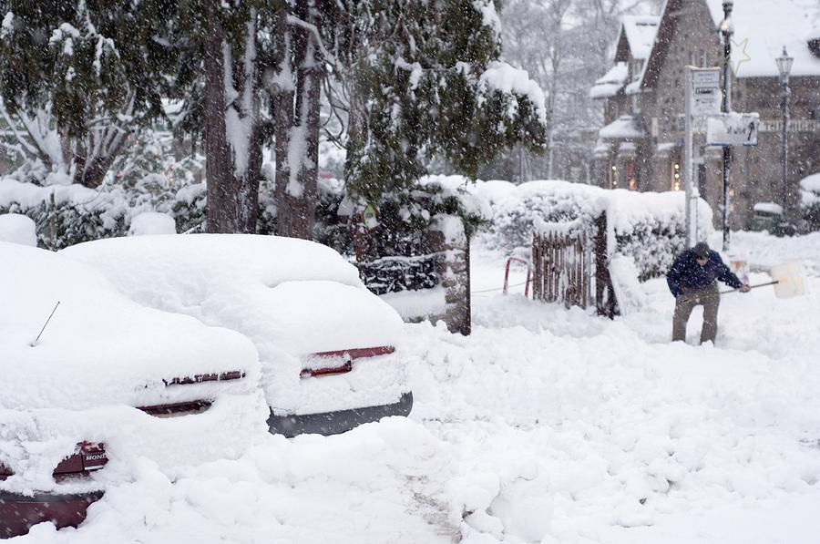 Man Clearing Snow, Braemar, Scotland Photograph By Duncan Shaw