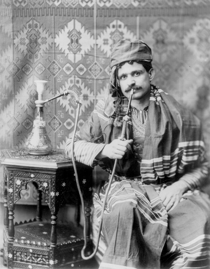 man-smoking-water-pipe-photograph-1901-everett.jpg