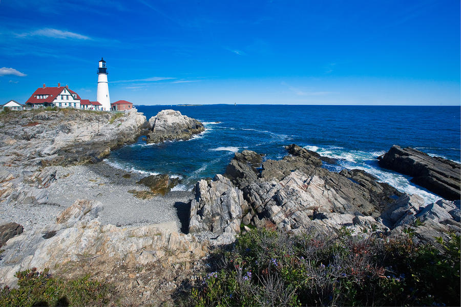 rocky-shoreline-with-lighthouse-portland-head-main-george-oze.jpg