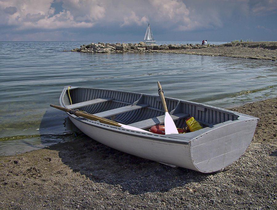 Row Boat On The Beach In Toronto is a photograph by Randall Nyhof 