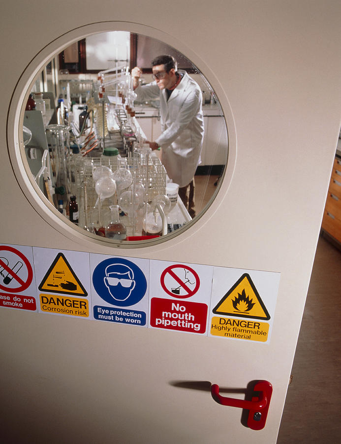 Safety Signs Seen On A Laboratory Door Photograph By Tek Image