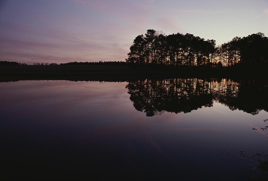 scenic-view-of-a-still-body-of-water-photograph-by-sam-kittner