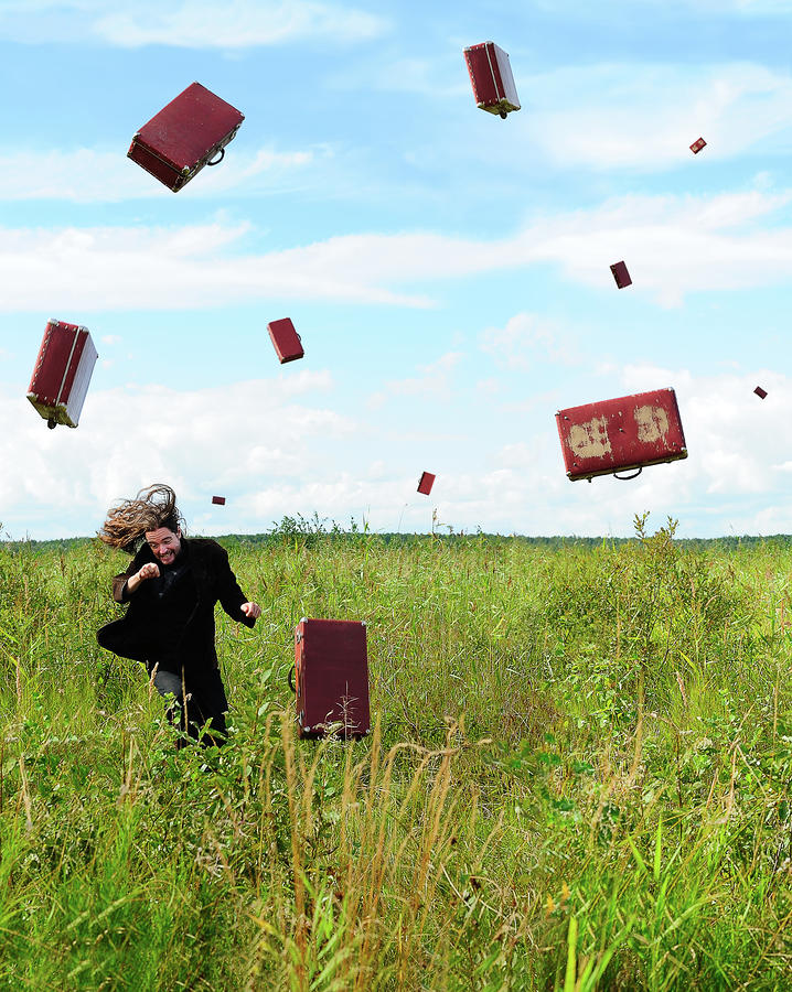  - suitcase-rain-roman-rodionov