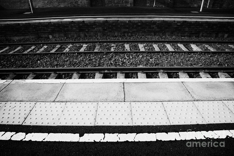 warning line and textured contoured tiles railway station platform and track northern ireland warning line and textured contoured tiles railway station platform and track northern ireland