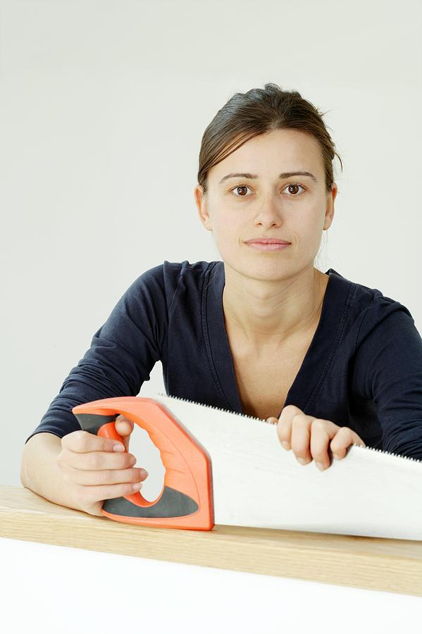 Woman Holding A Saw Photograph By Carlos Dominguez Fine Art America