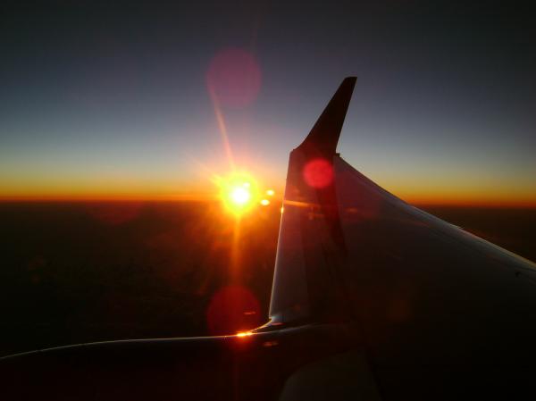 Plane wing at sunset Plane wing at sunset
