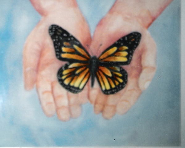 Butterfly In Hand