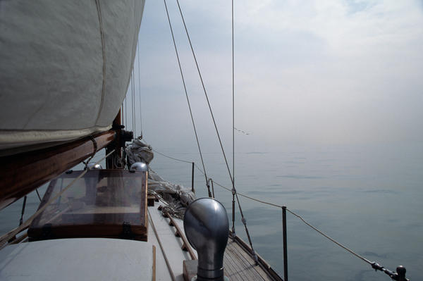 Classic Wooden Sailboat With No Horizon Off The Bow Photograph