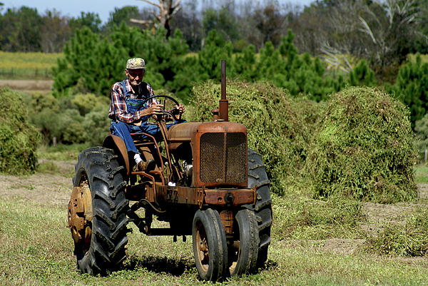 old-farmer-in-field-on-tractor-danny-jon