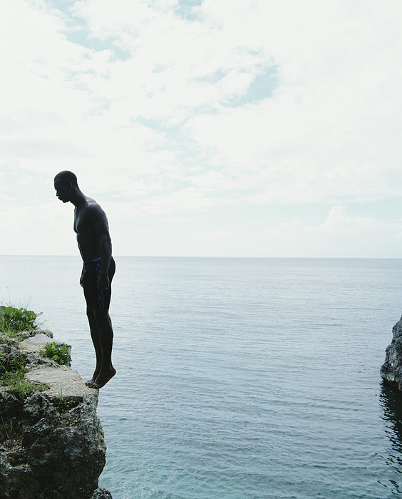 Jamaica Negril Man Standing On Edge Greeting Card By Momo Productions