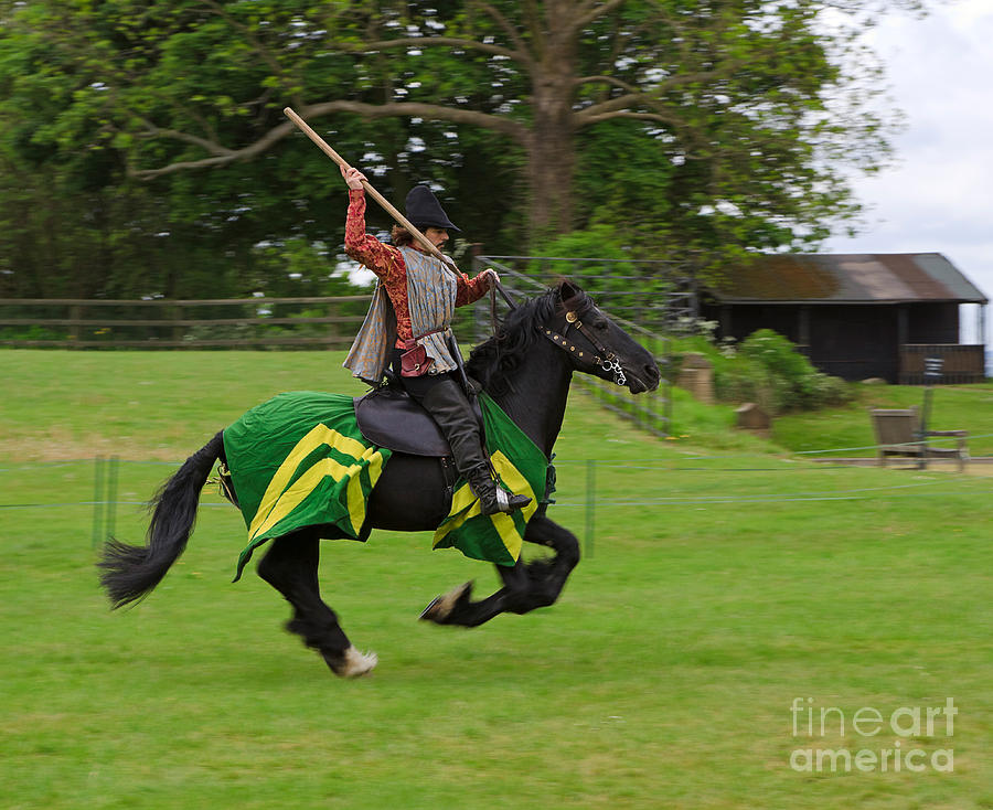 A Knight Practices Throwing A Javelin At A Medieval Reenactment Day Photograph by Louise Heusinkveld
