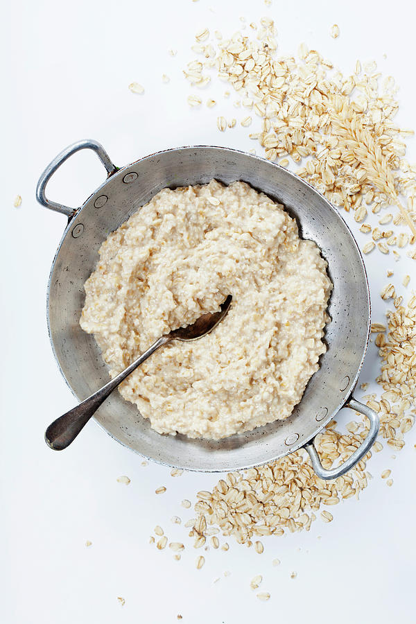 Bowl Of Oatmeal Porridge Photograph By Natalia Klenova Pixels