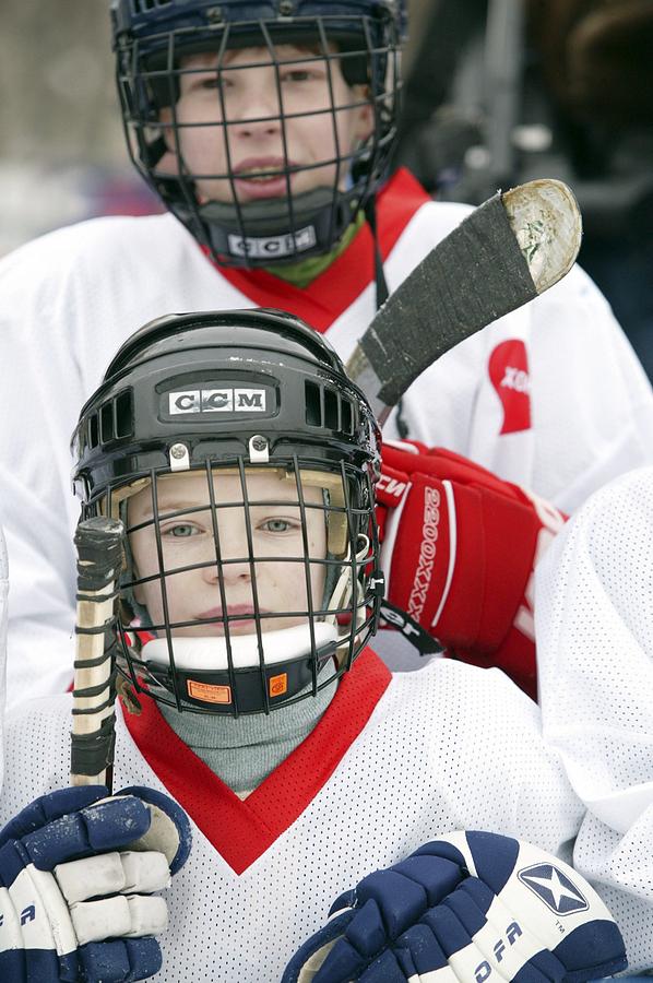 Boys Playing Ice Hockey Photograph by Ria Novosti