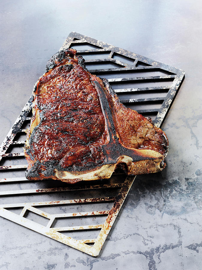 Porterhouse Steak Made In A Beefer On A Grilling Rack Photograph By