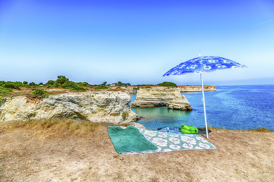 Umbrella And Stacks On The Coast Of Salento In Italy Photograph By