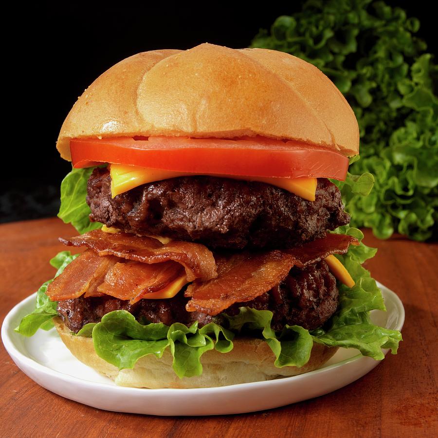 Double Cheeseburger With Bacon Tomato And Lettuce Photograph By Paul