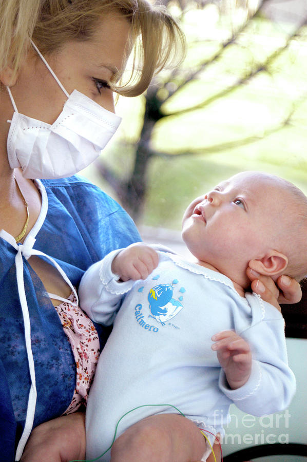 Mother Holding Her Premature Baby By Aj Photo Science Photo Library