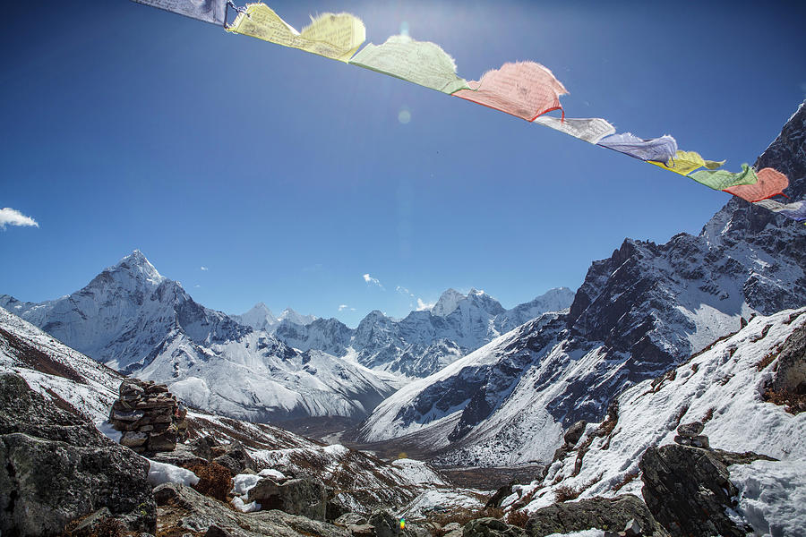 Prayer Flags In Front Of The Summit Of Ama Dablam In Nepal Photograph