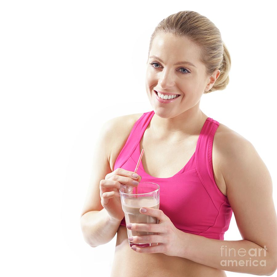 Woman Drinking Protein Shake Photograph By Science Photo Library