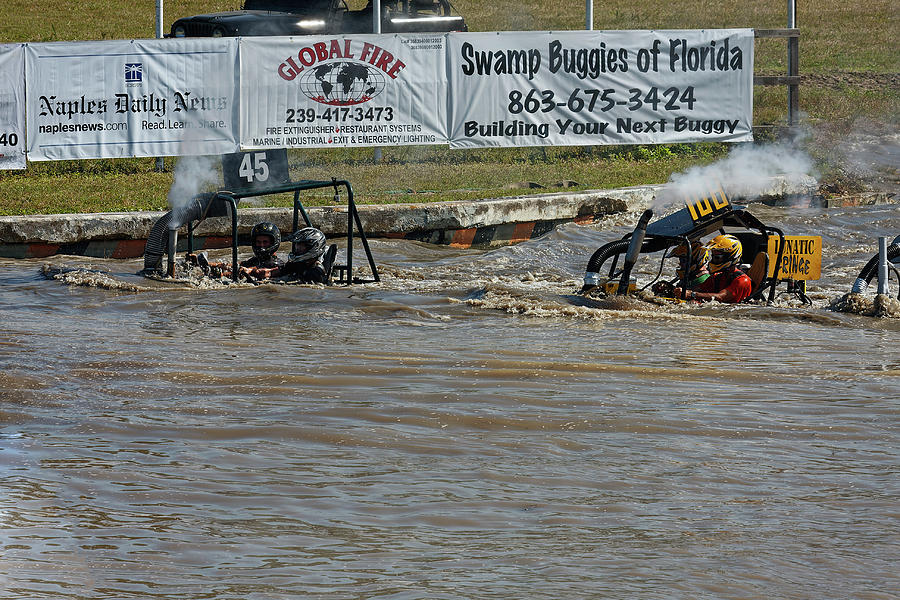 Swamp Buggies Submerged Photograph By Sally Weigand Pixels