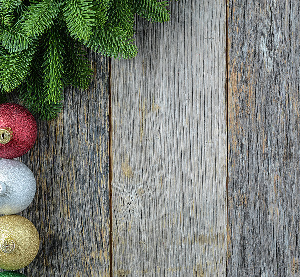 Christmas Pine Needle and Ornaments on a Rustic Wood Background Greeting  Card by Brandon Bourdages