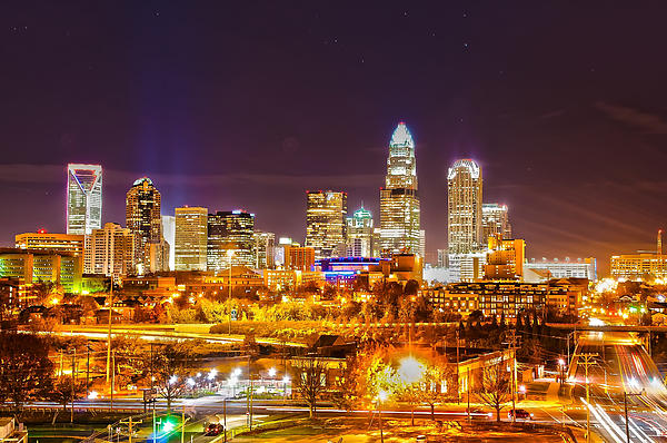 Skyline of uptown Charlotte North Carolina at night. by Alex Grichenko