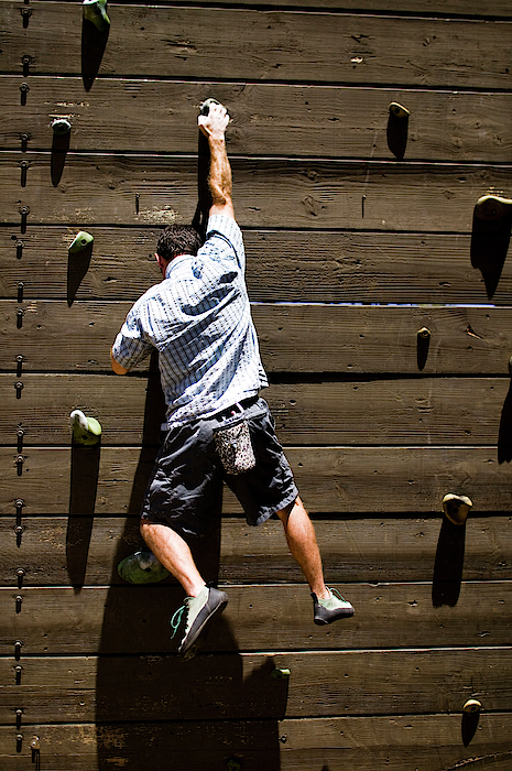 A Man Climbs A Climbing Wall Bath Towel For Sale By Jay Reilly