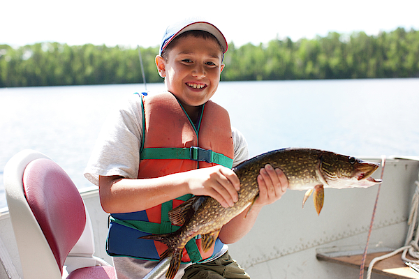 A Young Boy Holds A Northern Pike Kids T-Shirt by David Ellis - Fine Art  America