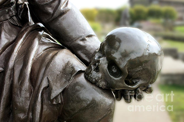 Hamlet contemplating the skull of Yorick stock image