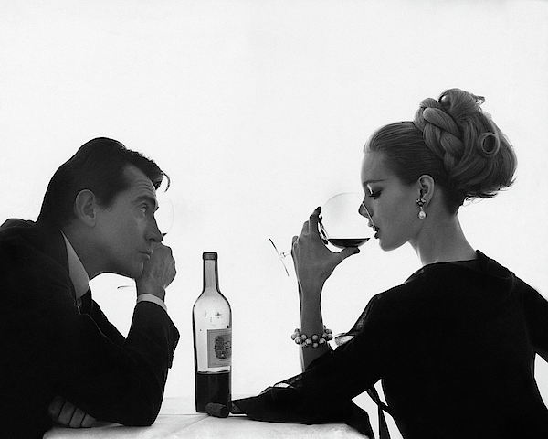 Bert Stern - Man Gazing at Woman Sipping Wine