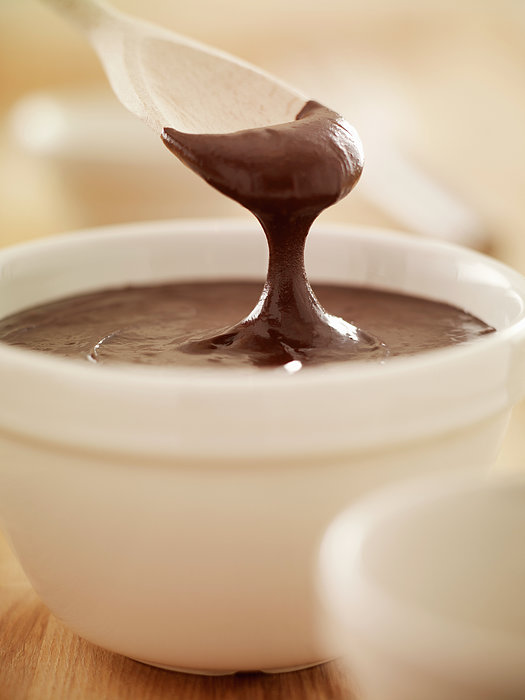 https://images.fineartamerica.com/images-medium-5/spoon-scooping-melted-chocolate-from-adam-gault.jpg