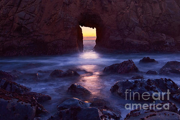 Sunset on Arch Rock in Pfeiffer Beach Big Sur in California