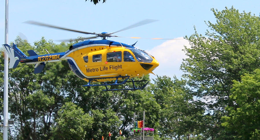       Metro Life Flight Photograph by R A W M  