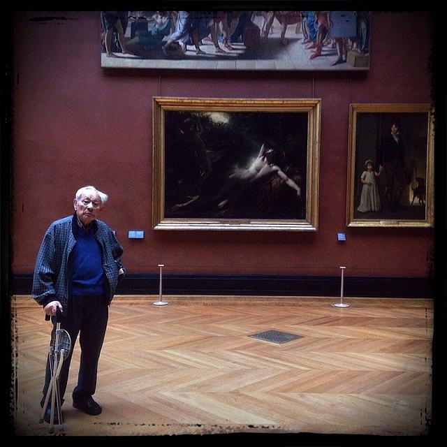 ... Contemplating ... The Louvre Photograph by Brian Cassey