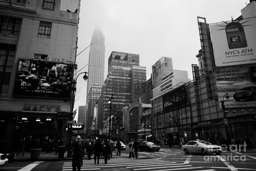 Winter Photograph -  Pedestrians Crossing Crosswalk Outside Macys 7th Avenue And 34th Street Entrance New York City by Joe Fox