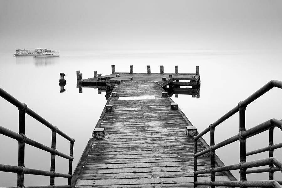 Black And White Photograph -   Tarbet Pier Loch Lomond by Grant Glendinning