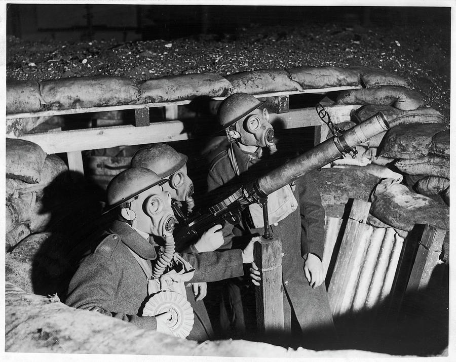 Anti Photograph -  Three Soldiers In A Pit  Wearing Gas by Mary Evans Picture Library