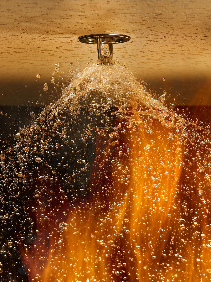  Fire Sprinkler Spraying #1 Photograph by Don Farrall