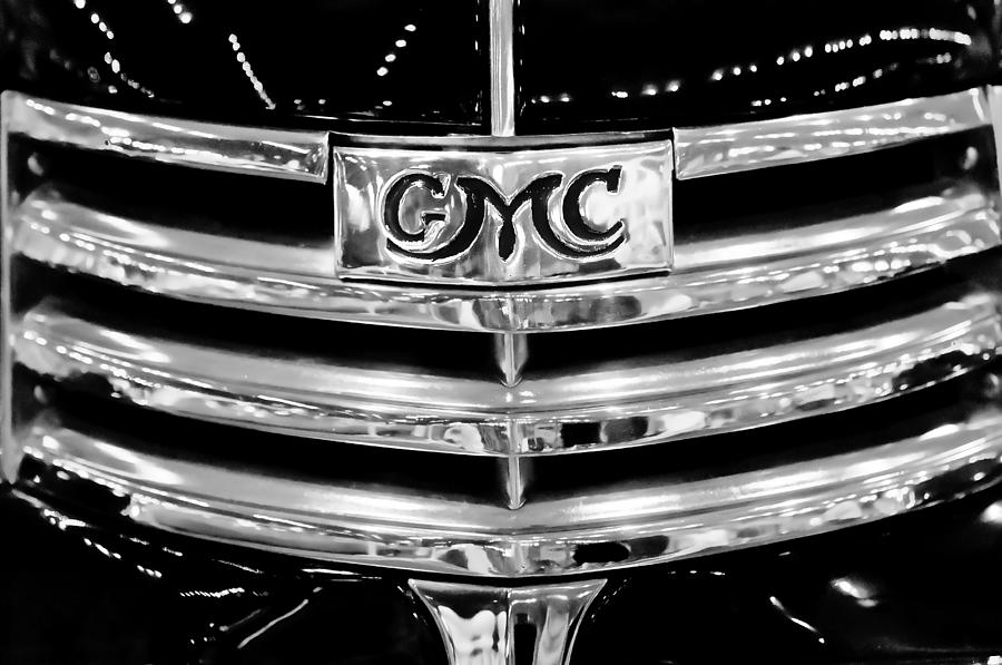 Car Photograph - 1941 GMC Suburban Woody Wagon Grille Emblem by Jill Reger