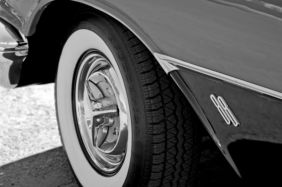 Black And White Photograph - 1956 Oldsmobile Holiday 88 Wheel by Jill Reger