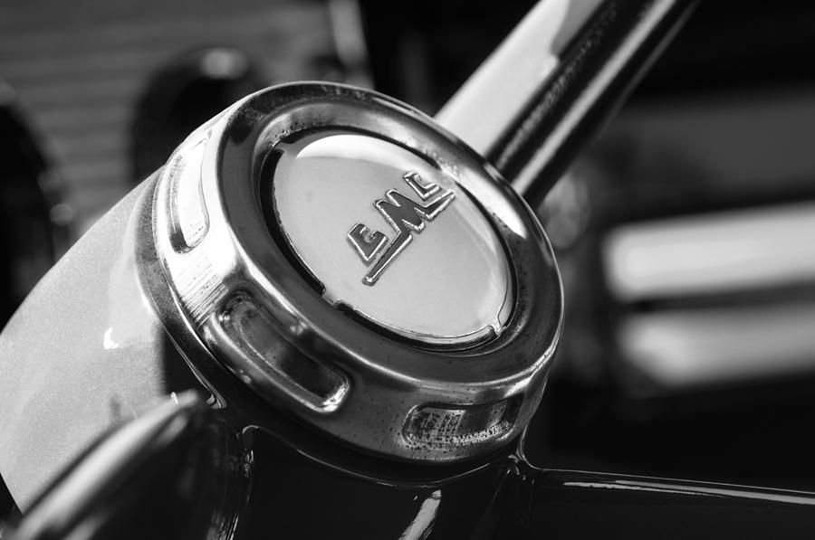 Car Photograph - 1958 GMC Suburban Steering Wheel Emblem by Jill Reger