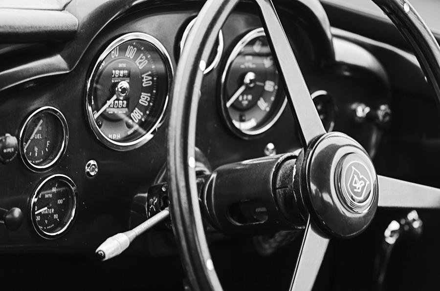 Car Photograph - 1960 Aston Martin DB4 GT Coupe Steering Wheel Emblem by Jill Reger