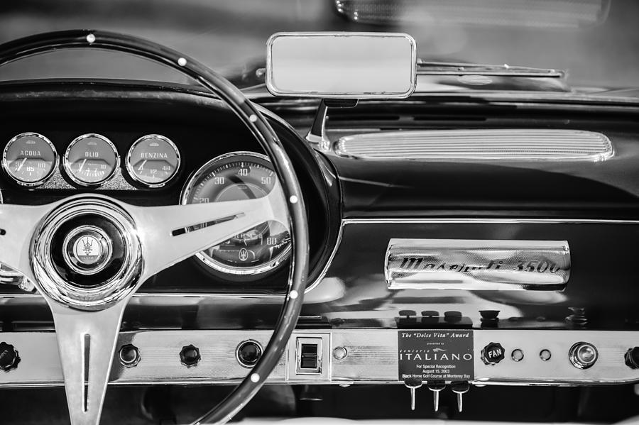Black And White Photograph - 1960 Maserati 3500 GT Spyder Steering Wheel Emblem by Jill Reger