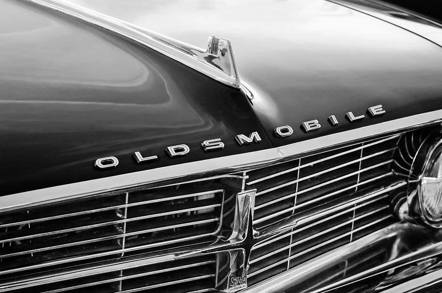1962 Oldsmobile Starfire Hardtop Hood Ornament - Emblem Photograph by Jill Reger
